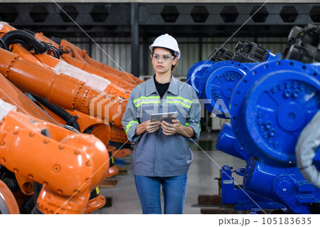 Maintenance engineer worker working with robotic machine automation 105183635