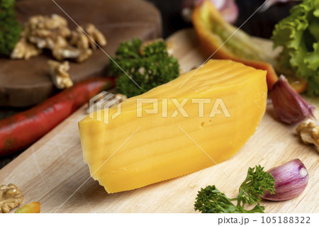Sliced hard cheese made from milk Sliced hard cheese made from milk 105188322