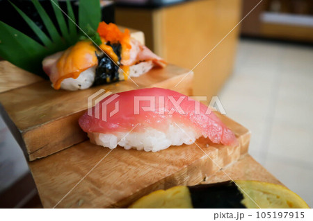 tuna, tuna roll, tuna rolls, tuna sushi or mackerel sushi tuna, tuna roll, tuna rolls, tuna sushi or mackerel sushi 105197915
