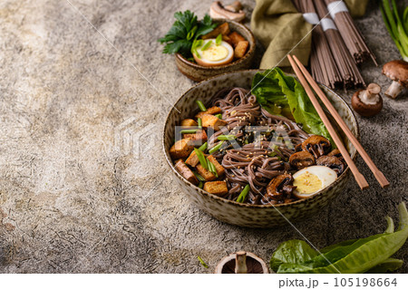 Soba noodle with tofu and mushroom Soba noodle with tofu and mushroom 105198664