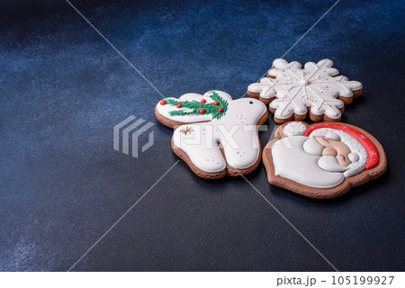 Beautiful festive Christmas gingerbread made by hand with decoration elements 105199927