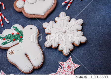 Beautiful festive Christmas gingerbread made by hand with decoration elements 105199941