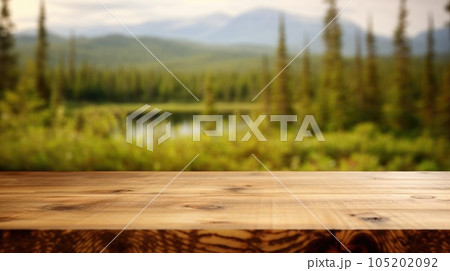 The empty wooden table top with blur background of Alaska nature. Exuberant. 105202092