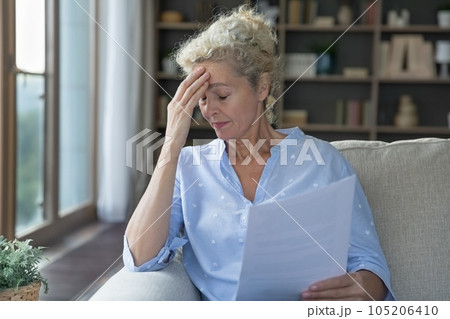 Upset senior elder woman shocked about health problems 105206410