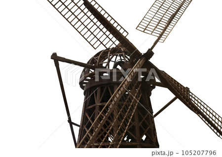 Old wooden mechanical windmill model isolated on white with clipping path. High quality photo 105207796