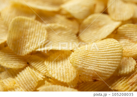 crispy golden potato chips snack texture background crispy golden potato chips snack texture background 105208035