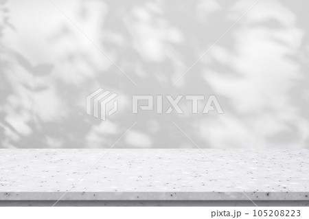 Marble table with tree shadow drop on white wall background for mockup product display 105208223