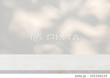 Marble table with tree shadow drop on white wall background for mockup product display Marble table with tree shadow drop on white wall background for mockup product display 105208224