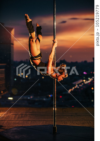 Young pole dancing woman 105219779
