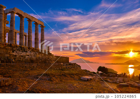 Sunset sky and ancient ruins of temple of Poseidon, Sounion, Greece Sunset sky and ancient ruins of temple of Poseidon, Sounion, Greece 105224865