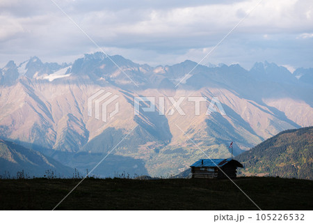 Mountain landscape with the peak of the clouds Mountain landscape with the peak of the clouds 105226532