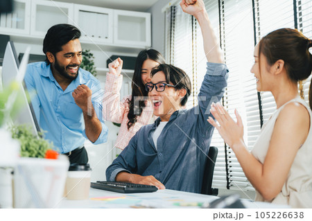 Happy group of business people working together at modern office, Business team meeting and brainstorming at company, Employees using laptop working with business project 105226638