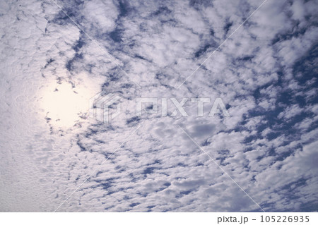 Blue sky full of white clouds, sunny day 105226935