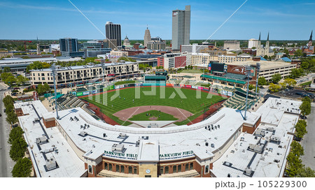 Skyscraper and church steeple skyline downtown Fort Wayne with Parkview Field baseball 105229300