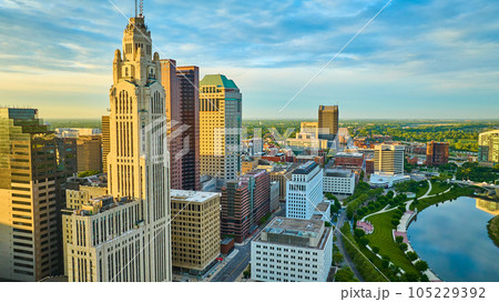 Columbus Ohio heart of downtown aerial at sunrise with iconic buildings and Scioto River Columbus Ohio heart of downtown aerial at sunrise with iconic buildings and Scioto River 105229392