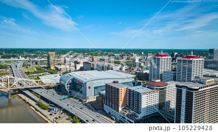 Partially cloudy blue sky over downtown Louisville KY aerial Galt House 105229428