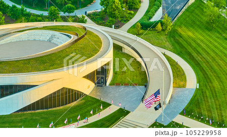 National Veterans Memorial and Museum at sunrise with American flag at half mast aerial National Veterans Memorial and Museum at sunrise with American flag at half mast aerial 105229958