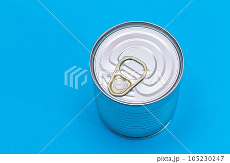Unopened Tin Can with Blank Edge on Light Blue Background 105230247
