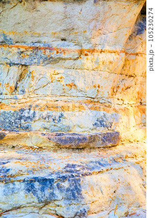 Painted Rocks in Michigan National Park close up of yellow stone with iron ore 105230274