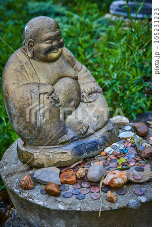 Tibetan Mongolian Buddhist statue with collection of rocks Tibetan Mongolian Buddhist statue with collection of rocks 105231223