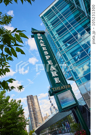 Shakespeare Theater entrance sign in Chicago on glass building with greenery 105231300