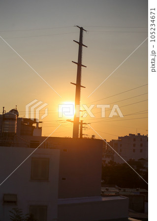 Sunset scene with shadow of electricity poles and houses, Ho Chi Minh City Sunset scene with shadow of electricity poles and houses, Ho Chi Minh City 105234671