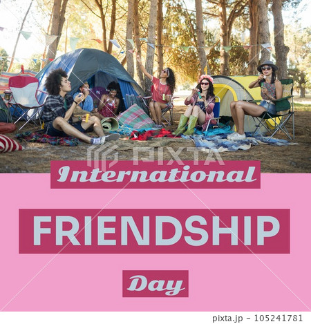 International friendship day text with happy diverse friends blowing bubbles at festival campsite 105241781