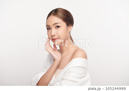 Beautiful young asian woman with clean fresh skin on white background, Face care, Facial treatment, Cosmetology, beauty and spa, Asian women portrait. 105244999