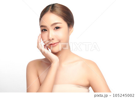 Beautiful young asian woman with clean fresh skin on white background, Face care, Facial treatment, Cosmetology, beauty and spa, Asian women portrait. Beautiful young asian woman with clean fresh skin on white background, Face care, Facial treatment, Cosmetology, beauty and spa, Asian women portrait. 105245002