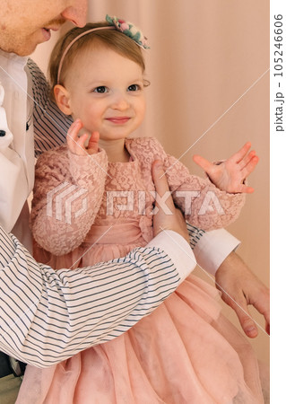 portrait of father with toddler daughter 105246606