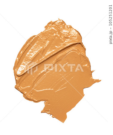 liquid makeup foundation, bb-cream isolated on white background. Gently beige strokes and texture of makeup foundation. liquid tonal cream smear. 105251201