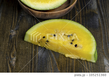 slices of sweet yellow watermelon 105251360