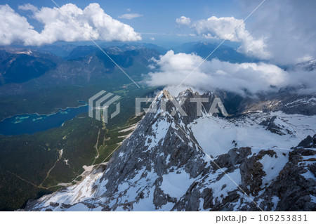 The view from the cable car. Lake, Mountain, Blue sky, white clouds, snow. 105253831