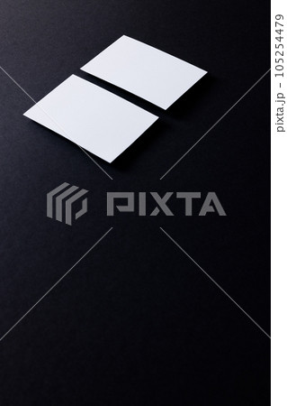White business cards with copy space on black background White business cards with copy space on black background 105254479
