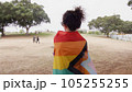 Woman with LGBT flag in the park on pride parade 105255255