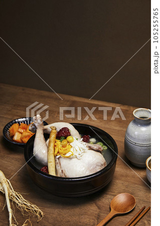 korean traditional food samgyetang, chicken soup with ginseng with korean traditional alcohol korean traditional food samgyetang, chicken soup with ginseng with korean traditional alcohol 105255765