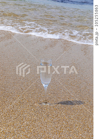 beach and champagne glass beach and champagne glass 105255863