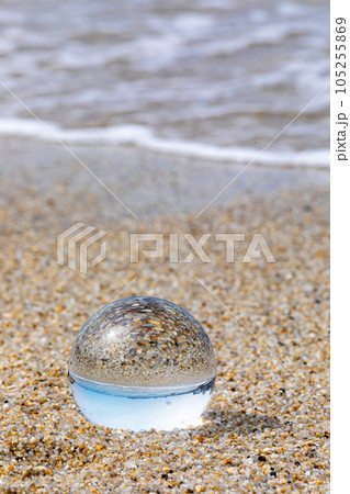 beautiful beach and glass ball 105255869