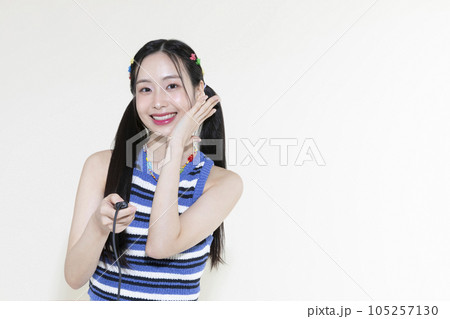 vintage y2k retro concept photo of korean asian cute woman taking selfie 105257130