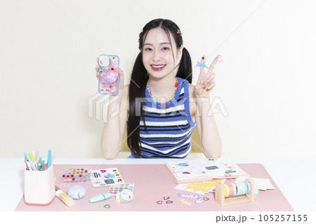 vintage y2k retro concept photo of korean asian cute woman decorating a diary 105257155