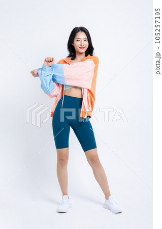 healthy beauty concept photo of korean asian beautiful woman stretching with jacket 105257195