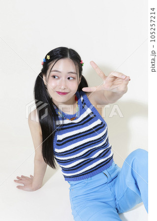 vintage y2k retro concept photo of korean asian cute woman sitting and posing 105257214