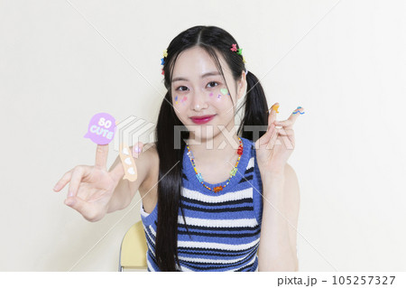 vintage y2k retro concept photo of korean asian cute woman with stickers 105257327