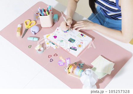 vintage y2k retro concept photo of korean asian cute woman decorating diary vintage y2k retro concept photo of korean asian cute woman decorating diary 105257328