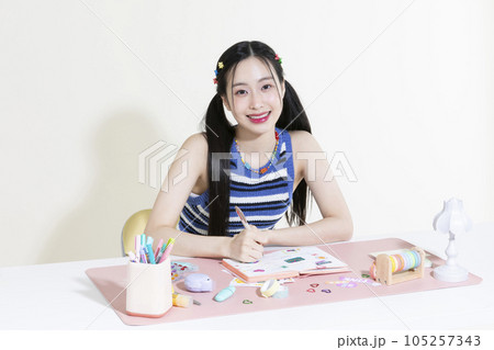 vintage y2k retro concept photo of korean asian cute woman decorating diary 105257343