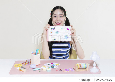 vintage y2k retro concept photo of korean asian cute woman with decorated diary 105257435