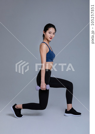 healthy beauty concept photo of korean asian beautiful woman with dumbbell 105257851