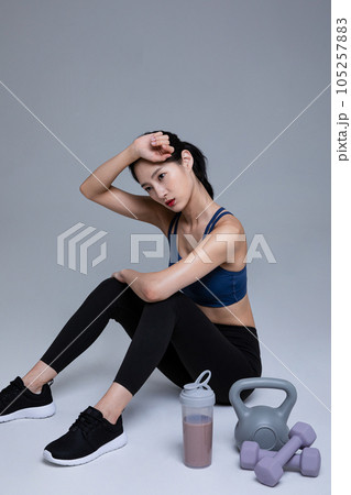 healthy beauty concept photo of korean asian beautiful woman with fitness machine healthy beauty concept photo of korean asian beautiful woman with fitness machine 105257883