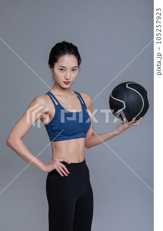 healthy beauty concept photo of korean asian beautiful woman with fitness ball 105257923