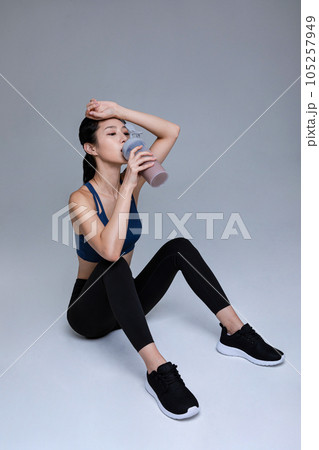 healthy beauty concept photo of korean asian beautiful woman with protein shakes healthy beauty concept photo of korean asian beautiful woman with protein shakes 105257949